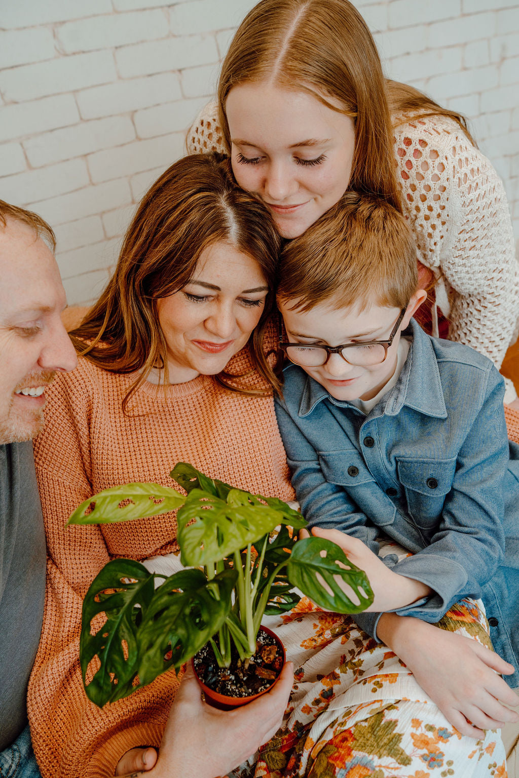 Family bonding over indoor plant care